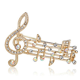 Брошь BROCHE Скрипичный ключ Ноты золотистая BRSF110928