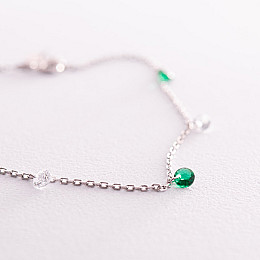 Браслет в серебре на ногу (зеленые и белые фианиты) 141625 Оникс 23