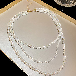 Бусы белые с жемчужинами с золотистой застежкой Bioworld (23252)