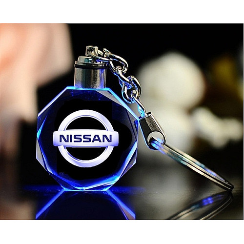 Брелок автомобільний на ключі Нісан GF авто брелок з логотипом Nissan з підсвіткою (23533412)