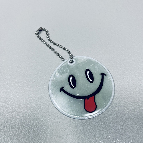 Светоотражающий брелок Stenson 38443-1 Смайлик Серый