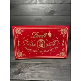Конфеты Lindt Рождественские сокровища в велюровой коробке 200г