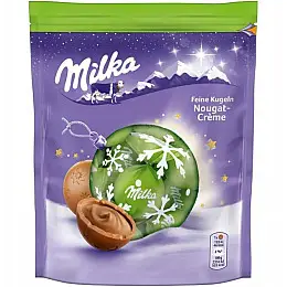 Новогодние конфеты Milka Bonbons Feine Kugeln Nougat-Creme 90 g